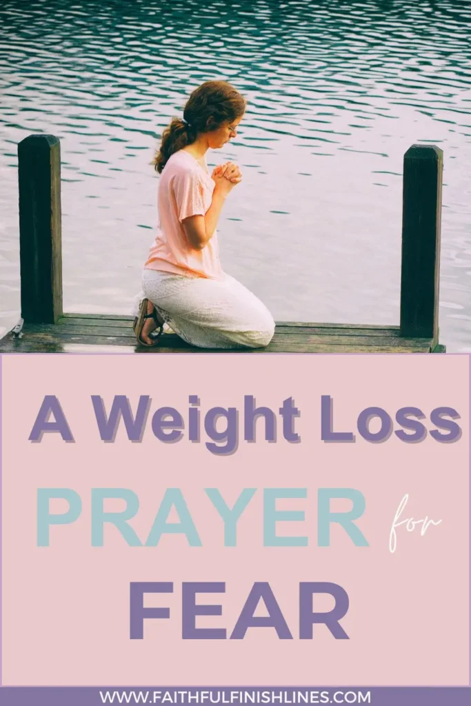 A woman kneeling on a dock with her hands clasped together with atext overlay that reads as A Weight Loss Prayer for Fear.