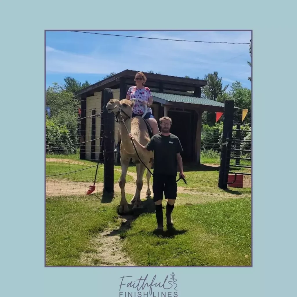 Tammy riding a camel